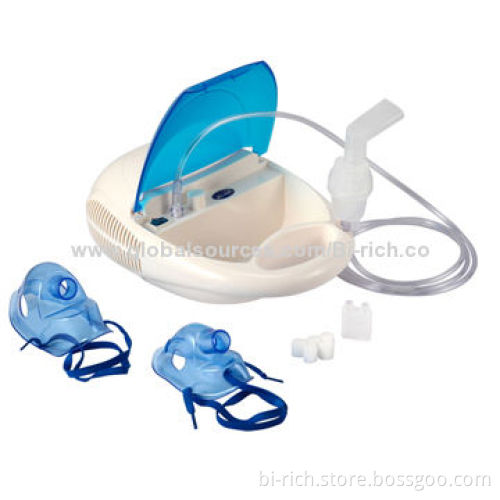 Flip top lid compressor nebulizer